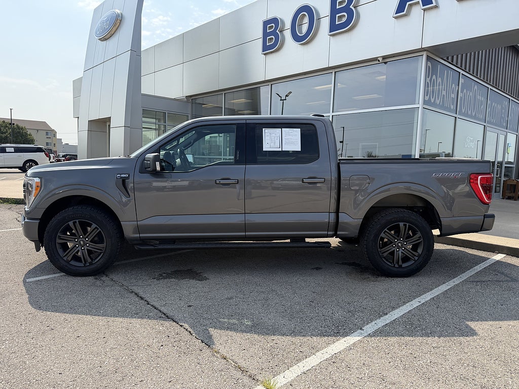 Used 2021 Ford F-150 XLT with VIN 1FTFW1E56MKE65010 for sale in Kansas City